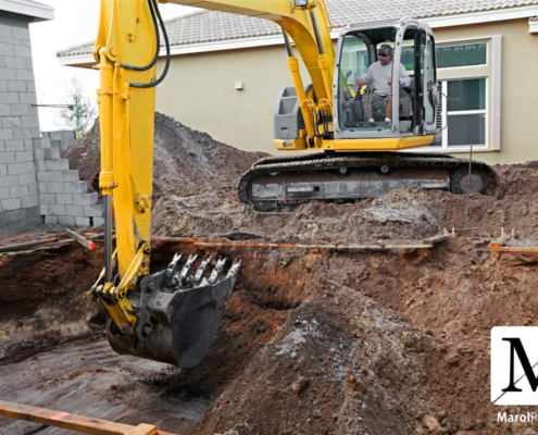 Etapa de escavação na construção de piscinas